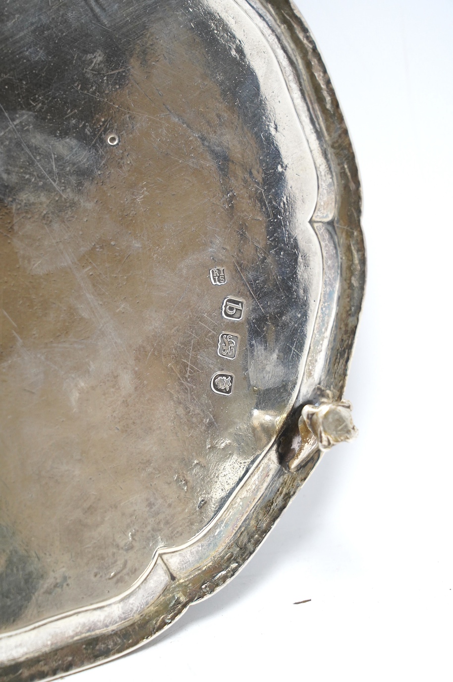 A George III silver waiter, by Jones & Scofield, London, 1777, with beaded border, on three claw and ball feet, 20.5oz, 13.3oz. Condition - poor